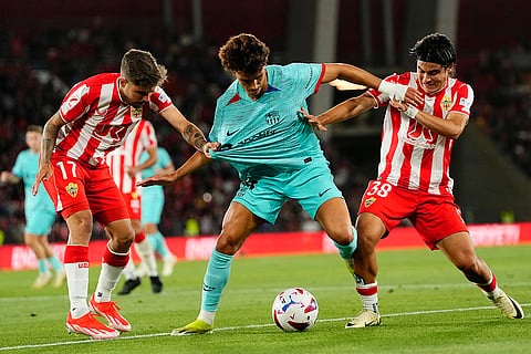 Joao Felix challenged by Alejandro Pozo and Luka Romero